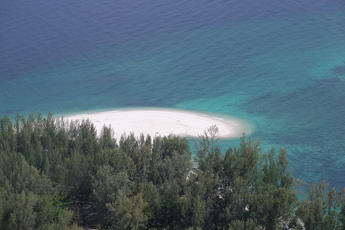 A white sand spit and casuarina trees on Koh Adang