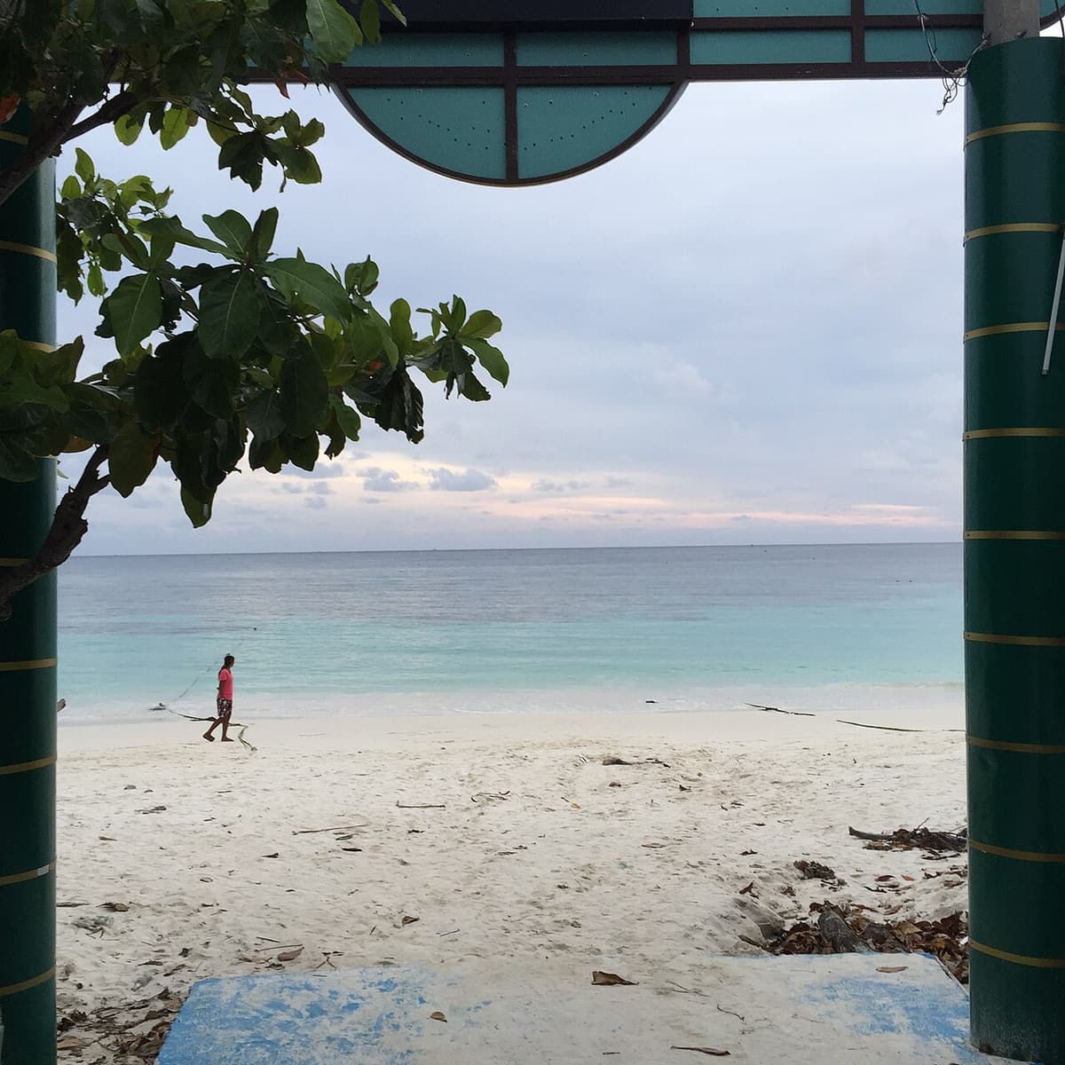 The white sand and turquoise water of Pattaya Beach seen from the end of Walking Street, Koh Lipe